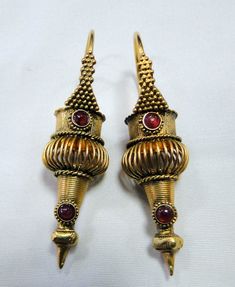 Gold earrings , vintage antique 22 k solid gold and natural Ruby set earrings dangles. Beautiful detailed workmanship pair in very good condition. Length-5.3 cm, weight -12.340 grams, material-22 K solid gold and natural Ruby gemstones. Gold Dangle Earrings, Ruby Earrings, 925 Silver Earrings, Natural Blue Sapphire, Ruby Gemstone, Gold Earrings Dangle, Natural Ruby, Sapphire Gemstone, Earrings Vintage