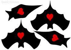 four black and red bats with hearts on them, all in the shape of heart