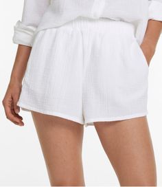 Cloud-like softness, effortless styling and a wonderfully crinkled texture in 100% cotton. These flattering cover-up shorts are the ideal layer for cool, carefree coverage by the water or a casual trip into town. High-Rise (Classic Fit): Sits at waist. Inseam 4". 100% cotton in a lightweight 4 oz. crinkled gauze. Machine wash and dry. Two hand pockets. Comfortable pull-on elastic waist. Imported. | Women's Cloud Gauze Cover-Up Shorts, Cotton Swimsuit Coverups Beach, Coverups Beach, Low Cut Swimsuit, Swimsuit Coverups, Active Swimwear, Modern Tops, Shorts Cotton, Coverup Skirt, Active Outfits