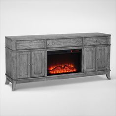 an entertainment center with a fireplace in it