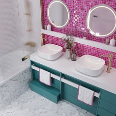 a bathroom with two sinks and mirrors on the wall