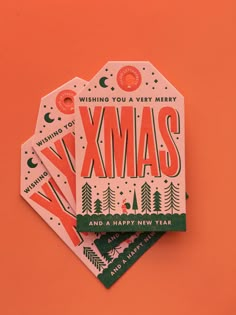 three christmas cards with the words xmas and a happy new year written on them