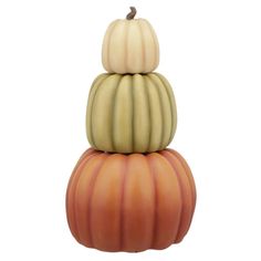 three pumpkins stacked on top of each other