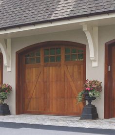 two large wooden garage doors sitting next to each other