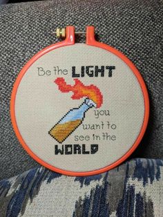 a cross stitch pattern with the words, be the light you want to see in the world