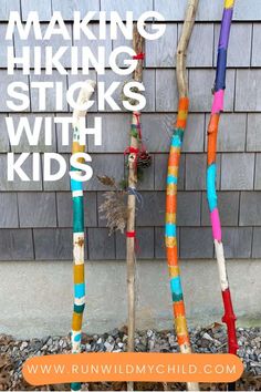 colorful sticks sticking out of the ground with text overlay reading making hiking sticks with kids