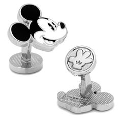 two mickey mouse cufflinks with black and white designs