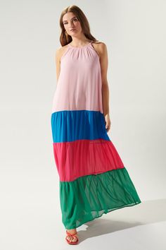 Summer embodied in this multicolor colorblock tiered maxi dress. Wear it poolside paired with a sunhat and sandals for the ultimate Summer outfit.- Color block maxi dress- Tiered skirt detail- High neckline- Back keyhole- Color: MultiSize + Fit - Model is 5'9" and wearing size S - Measurements taken from size S - Chest: 37"- Length from neckline: 54" Fabric Self: 100% Polyester, Lining: 100% Polyester Style Number STD12772A Colorblock Maxi Dress, Color Block Maxi Dress, Tiered Maxi Dress, Pink Maxi Dress, Tiered Skirt, High Neckline, Sweater Weather, Summer Outfit, Sun Hats