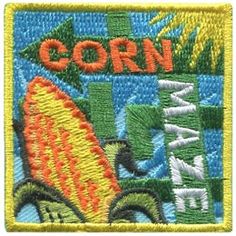 a patch with the word corn on it