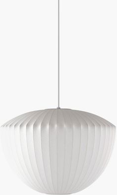 a white light hanging from a ceiling fixture