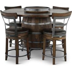 a round table with four stools around it and a wine barrel on the side