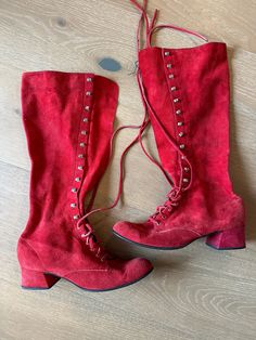 These are a pair of vintage suede Gogo boots from the 60s 70s. They are made by Palma nova in Spain. They are a tomato red/ orange color and the suede is very soft. Lace up suede laces are intact. Shoes are in great overall vintage condition. No obvious stains, marks or holes. Smoke free home. Size 6.5 16" tall 1.5" heel at tallest point 9 3/4" from toe to heel Vintage Gogo Boots, Red Lace Up Boots, Vintage Suede Boots For Fall, Vintage Red Winter Boots, Fitted Red Vintage Boots, Vintage Red Boots For Fall, Retro Suede Boots For Fall, Palma Nova, 60s Boots