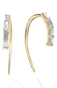 A quartet of baguette-cut diamonds enlivens the front of these graceful threader hoop earrings crafted from 14-karat gold. 3/4" drop Thread-through style Total diamond weight: 0.22ct. 14k gold/diamond Imported >Diamond Guide Baguette Jewelry, Bath And Body Works Perfume, Lana Jewelry, December 23, Diamond Guide, Baguette Cut Diamond, Earring Crafts, Diamond Hoop Earrings, Baguette Cut