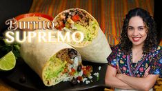 a woman standing in front of a burrito