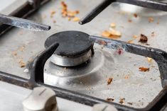 a stove top with two burners and no one on the burner or plate