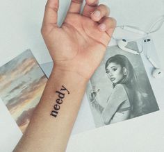 a woman's arm with a tattoo on it that says, neatty next to photos