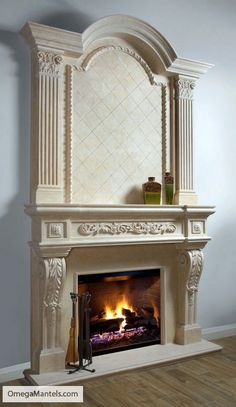 a white fireplace with a fire in it