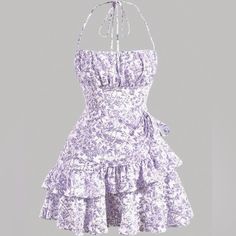 Floral Sundress Size Small. Brand New, Never Worn. Purple And White Design. Short Length Pastel Purple Casual Dress, Short Purple Dress Casual, Cotton Ruffle Halter Neck Dress, Cotton Halter Neck Dress With Ruffles, White Ruffled Halter Neck Sundress, White Halter Neck Sundress With Ruffles, Cotton Halter Neck Dress With Floral Print, Purple Simple Dress, Purple Party Dress Short