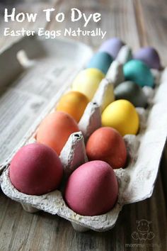 an egg carton filled with colored eggs on top of a wooden table and text overlay how to dye easter eggs naturally