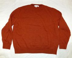 Offering a wonderful, men's sweater from Calvin Klein. This pullover features a crewneck, long sleeves and 2 1/2" ribbing along the cuffs and bottom. The style is a thin knit. Material is 100% Italian Merino Wool.The color is burnt orange. Men's size XXL (but fits smaller because of the wool blend). Please refer to listed measurements for further clarification. Measurements (taken straight across with garment lying down flat): Shoulder to shoulder: 18" Armpit to armpit (bust): 23" Bottom hem: 19 Orange Crewneck, Calvin Klein Men, Crewneck Sweater, Men's Sweater, Burnt Orange, Crew Neck Sweater, Merino Wool, Wool Blend, Long Sleeve Tshirt Men