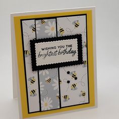 a greeting card with bees and daisies on it, which reads wishing you the brightest birthday