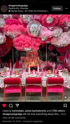 an image of a table set up for a party with pink and silver decorations on it