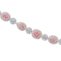 An elegant tennis bracelet showcasing 5.24 carats of GIA certified pink diamonds and 7.55 carats of round brilliant diamonds, set in 18 karat two tone gold. Dressy Hats, Diamonds Direct, Pink Diamond Ring, Diamond Tiara, Pink Diamonds, Diamond Tennis Bracelet, Diamond Bar, Pink Jewelry, Virtual Fashion