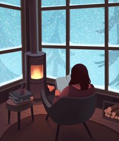 a woman sitting in a chair reading a book near a window with snow falling on the outside