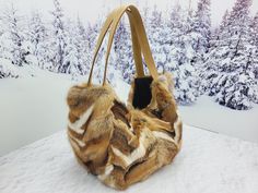 NEW exclusive handbag from red fox fur! Unique design, high quality materials and garment accessories.  UPPER MATERIALS - real fox fur INSIDE MATERIALS - textile lining  Dimensions - 28 cm wideness                         20 cm height                         17cm depth Leather strap (48cm) Mag lock 3 pockets inside Beautiful accessory! Be unique with LITVIN! Fur Handbag, Luxury Winter Faux Fur Bags, Luxury Chic Faux Fur Bags, Luxury Faux Fur Shoulder Bag With Fur Lining, Luxury Faux Fur Shoulder Bag, Fur Purse, Fur Bag, White Fur, Red Fox