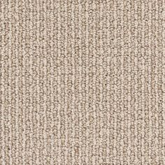 an image of a beige carpet textured with coarsed lines and small dots in the middle