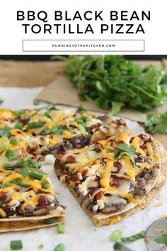 a pizza topped with cheese and black beans