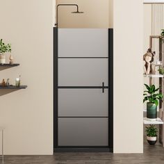 an open door in a room with shelves and potted plants