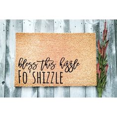 a door mat that says, bless this rose to shizzle