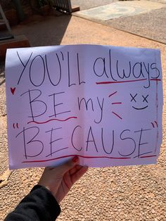 someone holding up a sign that says you'll always be my because