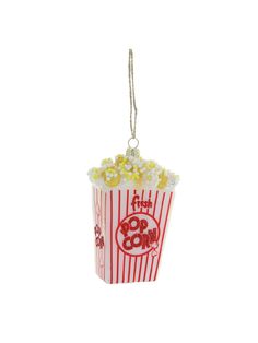 a popcorn bag ornament hanging from a string