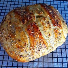 a loaf of bread sitting on top of a cooling rack