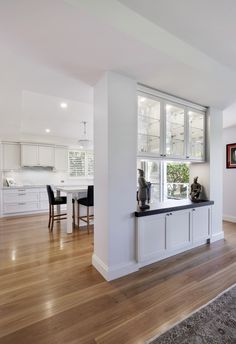 the kitchen is clean and ready to be used as a dining room or living room