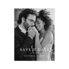 a black and white photo of a couple holding each other with the words save date on it