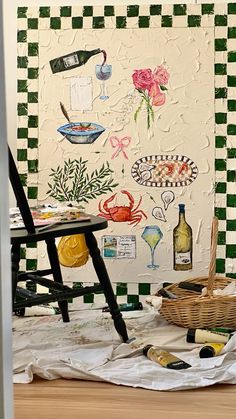 a chair sitting next to a wall covered in wine bottles and other items on top of a wooden table