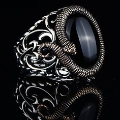 Silver Onyx Ring , Silver Snake Model Ring , Silver Serpent Ring , Men Gothic Design Snake Ring , 925k Sterling Silver Ring , Gift For Him ★Item Details * Gender : Male / Female * Material : 925K Sterling Silver * Total weight : 12 Grams * Gemstone : Onyx Stone ✔ Ready to Ship in 1-2 Business Days .. ✔ Shipped to the Worldwide 1-5 business days with free shipping... ✔ The product will be sent to you with a handmade wooden box to avoid any damage during shipping... ✔ Visit our store, browse other Armor Rings, Emerald Stone Rings, Serpent Ring, Snake Ring Silver, Gothic Design, Lapis Lazuli Ring, Ring Men, Snake Ring, Citrine Stone