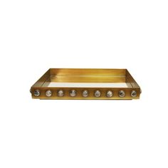 a gold tray with silver beads on the bottom and two rows of holes in the middle