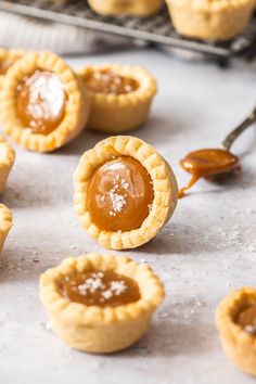 mini pies with peanut butter and jelly filling on the top are ready to be baked