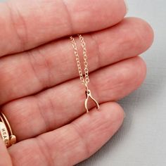 The cutest tiniest little gold wishbone charm made from Italian bronze hangs from gold filled chain. measures under 1/2 inch. Comes in a Organza bag, gift box available or additional $1 Wishbone Necklace Gold, Wish Necklace, Wishbone Necklace, Gold Filled Chain, Organza Bags, Silver Hoop Earrings, Necklace Gold, Gift Necklace, Cute Gifts