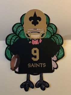 a paper cut out of a football player with a helmet on it's head