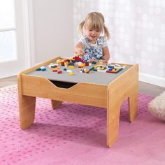 Our Activity Play Table is sturdy and strong, giving young kids a perfect spot for letting their imaginations run wild. 200 LEGO compatible blocks are included, so the good times can start right away. The Activity Table is large enough for multiple children to play at once and features a convenient storage space under the play board. Parents will love how the play table keeps bedrooms more organized and moves the action closer to eye level. Table measures 25 x 23 x 16 inches. Ages 3 and up. 195 Table Lego, Kids Play Table, Kids Activity Table, Lego Table, Play Table, Multiplication For Kids, Activity Table, Floor Table, Wooden Train