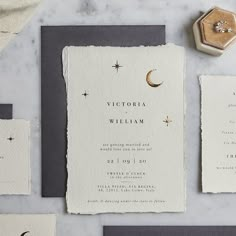 the wedding stationery is laid out and ready to be put into their guests'names