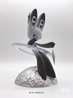 a cartoon character holding a surfboard on top of a white surface with water droplets around it