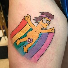 the simpsons character is on top of a rainbow flag