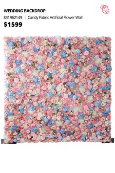 a pink and blue rug with flowers on it