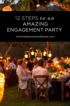 an outdoor dinner party with candles and people sitting at the table